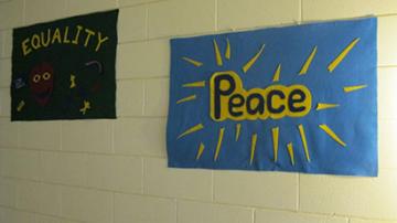 equality and peace felt signs saying "Equality" and "Peace"