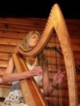 Patrice Haan playing her harp