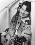 photo of sally rogers holding her dulcimer
