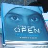 Book "Eyes Wide Open" on display.