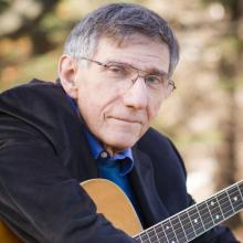 Bob Franke with his guitar