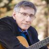 Bob Franke with his guitar